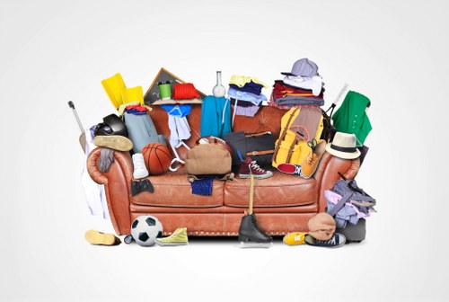 Professional house clearance team in Hendon removing furniture